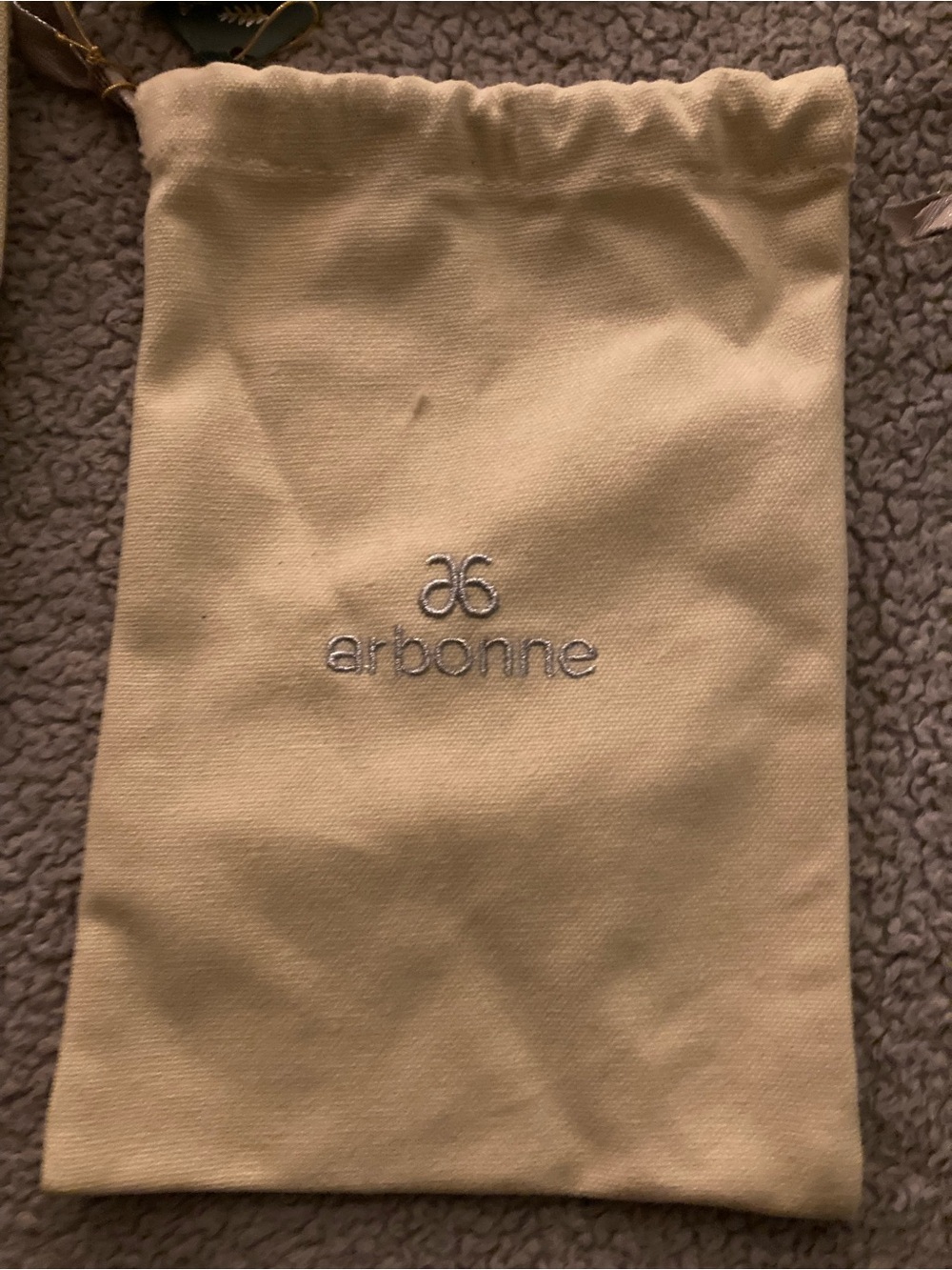Arbonne Cream Drawstring Storage Pouch with Silver Logo